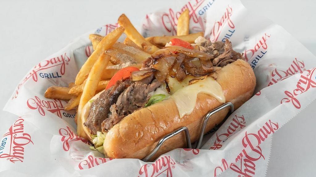 Glory Days® Cheesesteak · Our version of the Philly classic. Thinly sliced grilled steak, grilled onions, lettuce, tomatoes, mayo, and melted cheese.