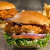 Buttermilk Fried Chicken Sandwich · Hand-breaded chicken lightly coated and fried to a crispy golden brown. Served either Classi...