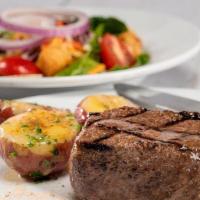 Center-Cut Sirloin Steak† · 8-ounce USDA Choice sirloin and a choice of sides. Served with choice of Caesar salad or tos...