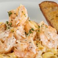 Shrimp Pasta (Full Portion) · Large sautéed shrimp and fresh fettuccine tossed in housemade garlic cream sauce.