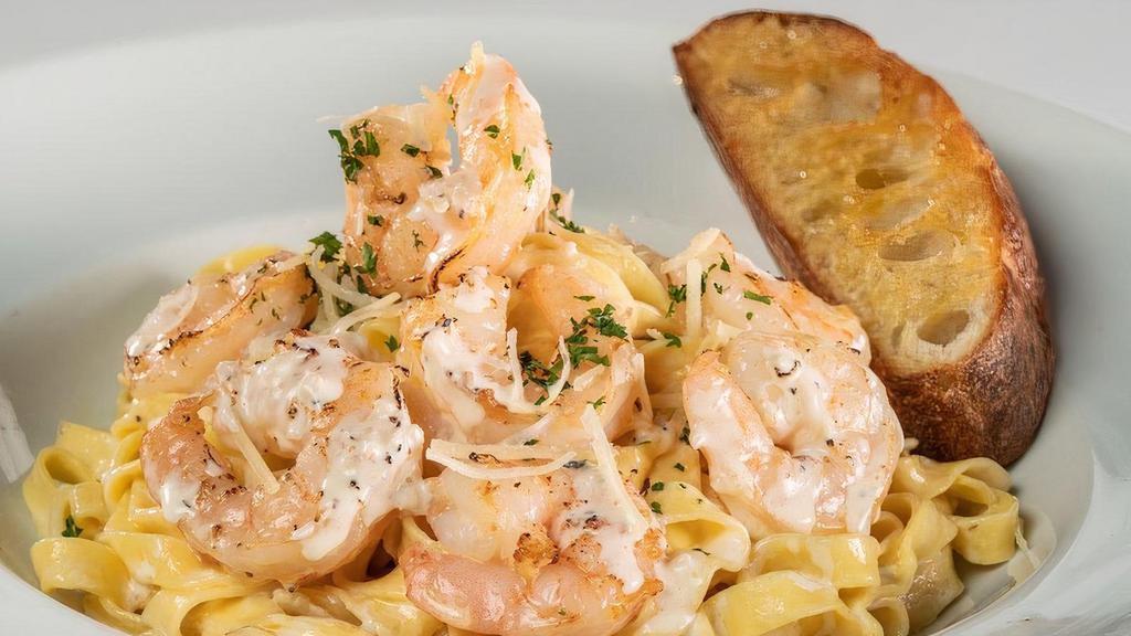 Shrimp Pasta (Full Portion) · Large sautéed shrimp and fresh fettuccine tossed in housemade garlic cream sauce.