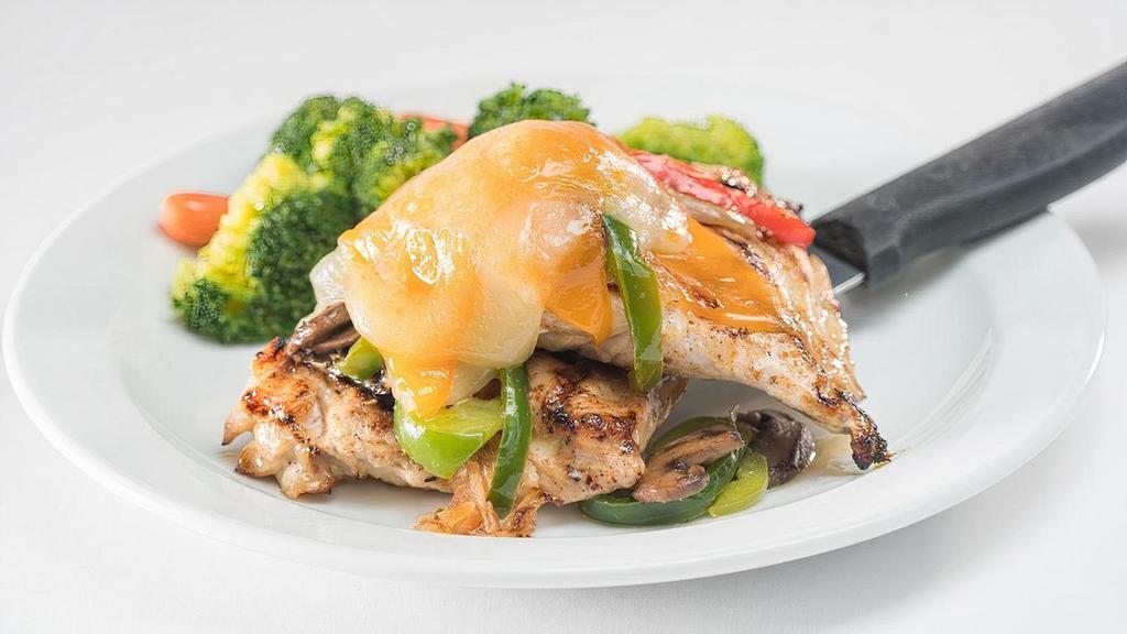 Smothered Chicken · Grilled boneless skinless chicken topped with melted provolone, cheddar, and Swiss cheeses, sautéed mushrooms, peppers, and grilled onions. Served with seasonal vegetables. .