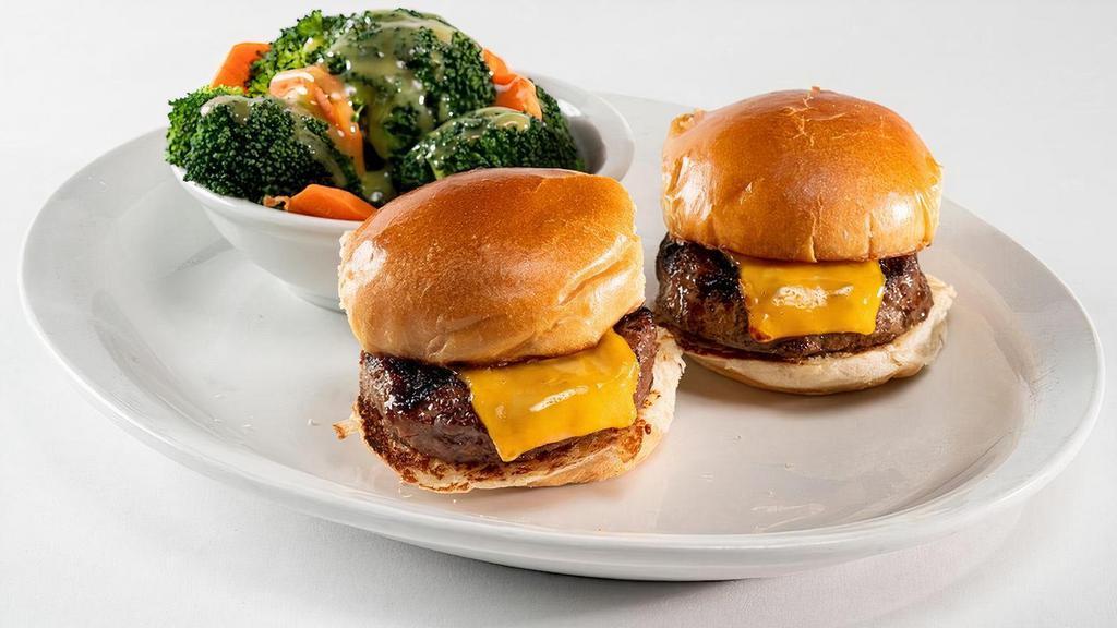 Cheeseburger Slider (2 Sliders) · Two mini cheeseburgers on a soft roll with a side. Calories calculated based  on a side of seasonal vegetables.