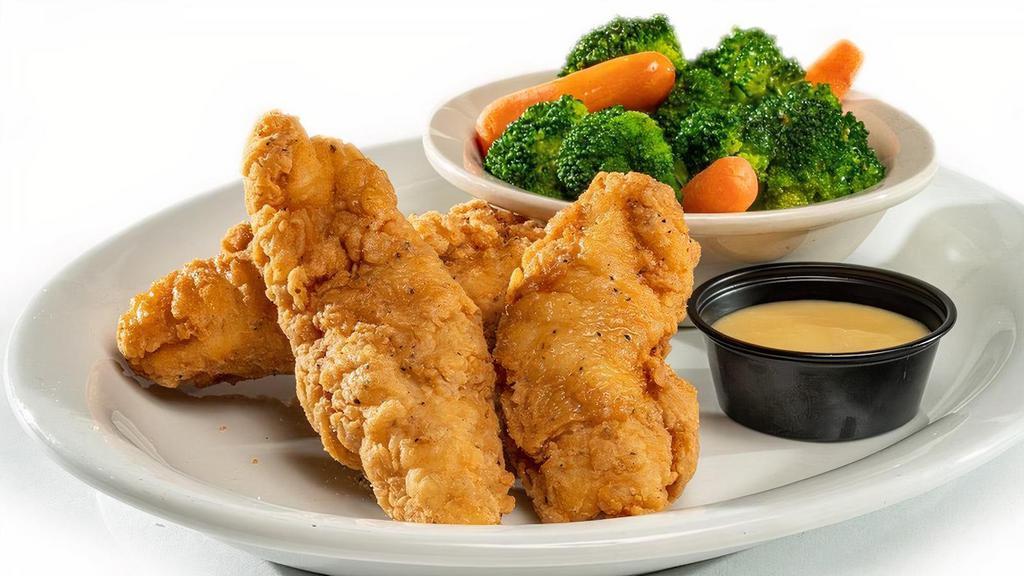 Crispy Chicken Tenders (3 Pieces) · Three fried chicken tenders served with a side. Calories calculated based  on a side of seasonal vegetables.  Dipping sauces available.