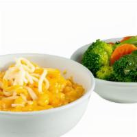 Homemade Macaroni & Cheese · Extra Cheesy! Served with a side.  Calories calculated based  on a side of seasonal vegetabl...