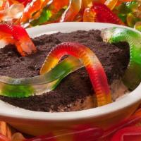 Worms & Dirt · Gummy worms crawl out of chocolate pudding topped with crushed cookie crumbs.