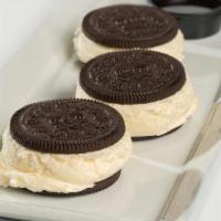 Ice Cream Slider · One Ice cream sandwich with vanilla ice cream, Oreo® chocolate wafers, and Hershey's® syrup ...