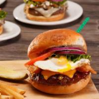Gf Glory Burger®† · BBQ sauce, bacon, cheddar, and a soft fried egg†. . (No fried onion straws).