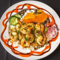 Camarones Bohemios · Shrimp sautéed in a lime and tequila sauce with sweet peppers, onions, and parsley. Served o...