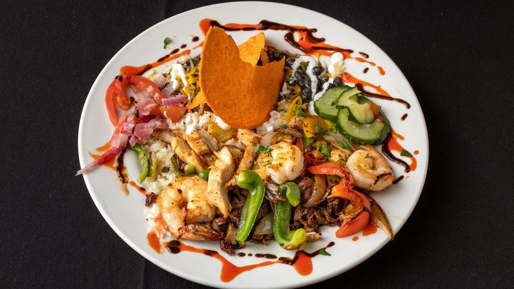 Cuzco'S Fajitas · Your choice of protein grilled with onions and sweet peppers and served with warm tortillas, pico de gallo, cheese, sour cream, black beans, and rice.
