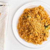 Chicken Pad Thai · Hot and spicy. Rice noodles stir-fried with crushed toast peanuts and scallion egg. Served w...