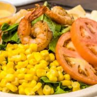 Atlantic Salad · Salad, tomato, smoked salmon, shrimp, corn, hearts of palm, and Ziba's vinaigrette.
