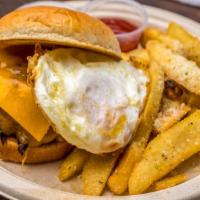 Bistro Hamburger · 100% beef burger topped with a fried egg, served with pomme frit cheese.