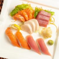  Sushi & Sashimi Combo · Five piece sushi, nine piece sashimi and tuna roll.