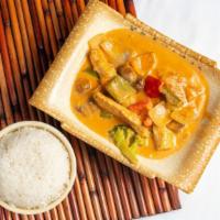 Red Curry · Choice of chicken, beef or shrimp in coconut milk with green pepper, red pepper, onion, broc...