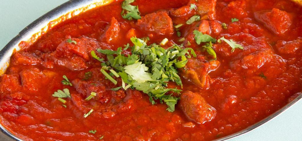 Lamb Vindaloo · Lamb cooked in hot spices in a highly seasoned gravy of potatoes, tomatoes and chili pepper.