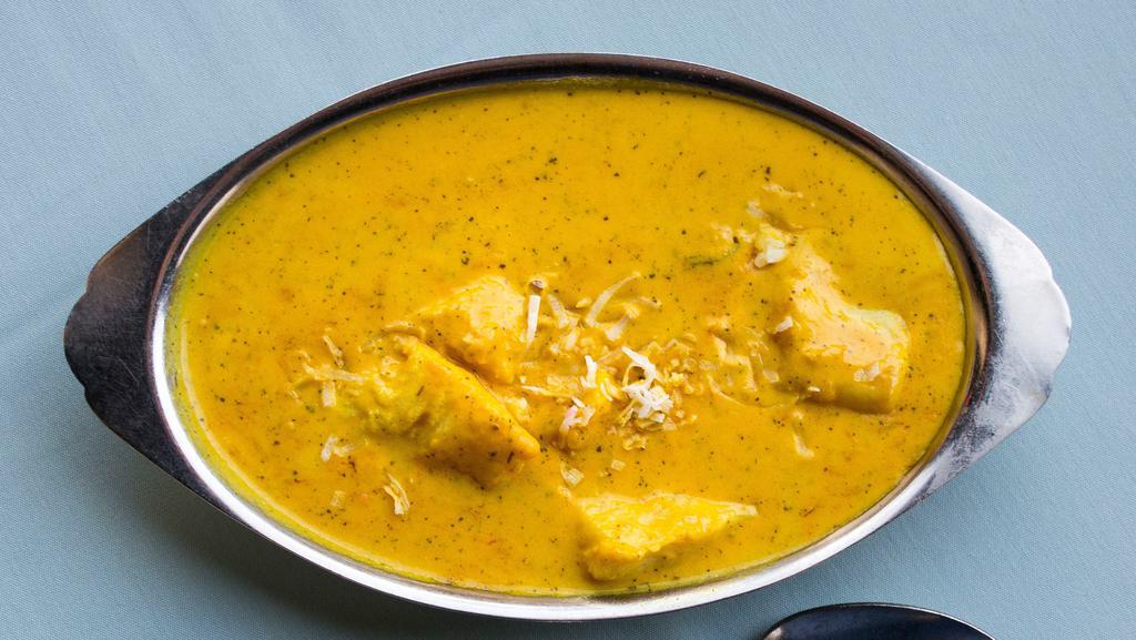 Fish Korma · Fish cooked with onion, cashew nuts, golden raisins, cream and mild curry spices.