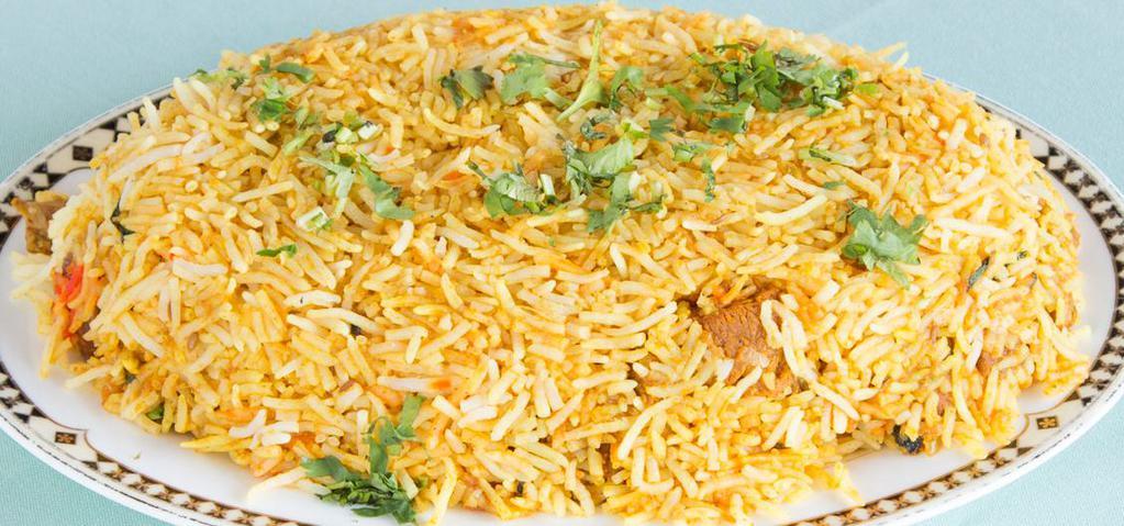 Lamb Biryani · Aromatic basmati rice with lamb meat cooked in mild spices, saffron, nuts and seasonings.