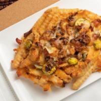 Carolina Cheese Fries · French fries topped with a blend of cheddar cheese and mozzarella cheeses, bacon and jalapen...