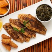 Blackened White Fish · Grilled white fish fillets served with our homemade tartar sauce