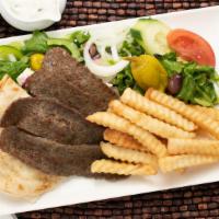 Gyro Platter · Seasoned lamb, pita points, tzatziki sauce, Greek salad and fries
