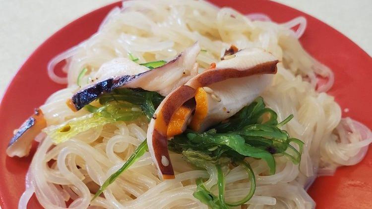Noodle Salad · Rice bean thread noodles, seaweed salad, squid salad, house dressing.
