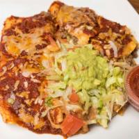 Enchilada Special · Two enchiladas, rice and beans. Ground beef, cheese chicken or shredded beef, (additional ch...