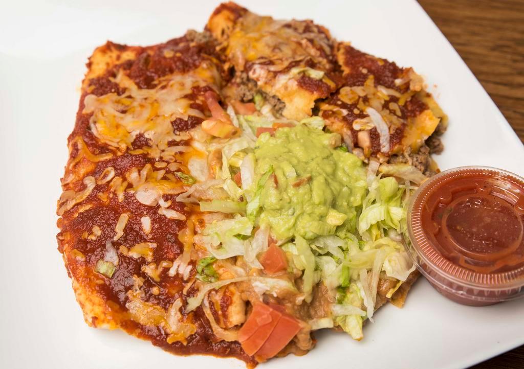 Enchilada Special · Two enchiladas, rice and beans. Ground beef, cheese chicken or shredded beef, (additional charge for) grilled chicken, steak, or shrimp.