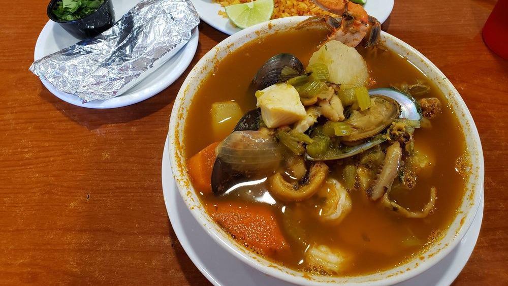 Caldo De Mariscos · Seafood soup. A large bowl of soup prepared with shrimp, fish, crab meat, crabs and vegetables. Served with tortillas.