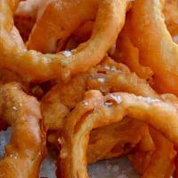 Onion Rings · Up your snack and side dish game with a crowd-friendly, and crispy Beer-Battered Onion Rings