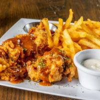Habanero Chicken Fingers · We lightly bread 3 well seasoned all white meat chicken fingers and serve with fries and our...