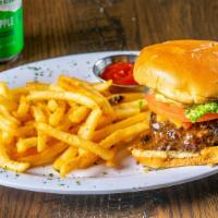 The Big Mon Jerk Burger · A mildly spicy burger, well seasoned with house made Jamaican jerk sauce.  Served with lettu...