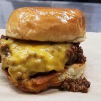 Chili Cheese Burger · The classic hot dog made into a burger. ½ lb. hand-pattied beef topped with shredded cheddar...