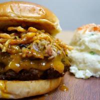 Goldrush Burger
 · Pork meets beef. 1/2 lb hand-pattied beef with pepperjack cheese, pork BBQ, and fried onions...