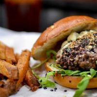 The Blues Burger With Side Salad · Blackened burger with bleu cheese and balsamic reduction served on a potato bun with lettuce...