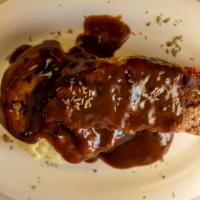 Meatloaf · Served with mashed potatoes gravy and soup or salad.