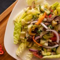 Beef Salad · Yum neur. Sliced grilled beef tossed with spicy lime juice mixed with onions, cucumber, toma...