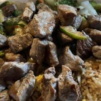 Hibachi Steak · Served with fried rice or white rice egg roll onion zucchini broccoli and carrot.