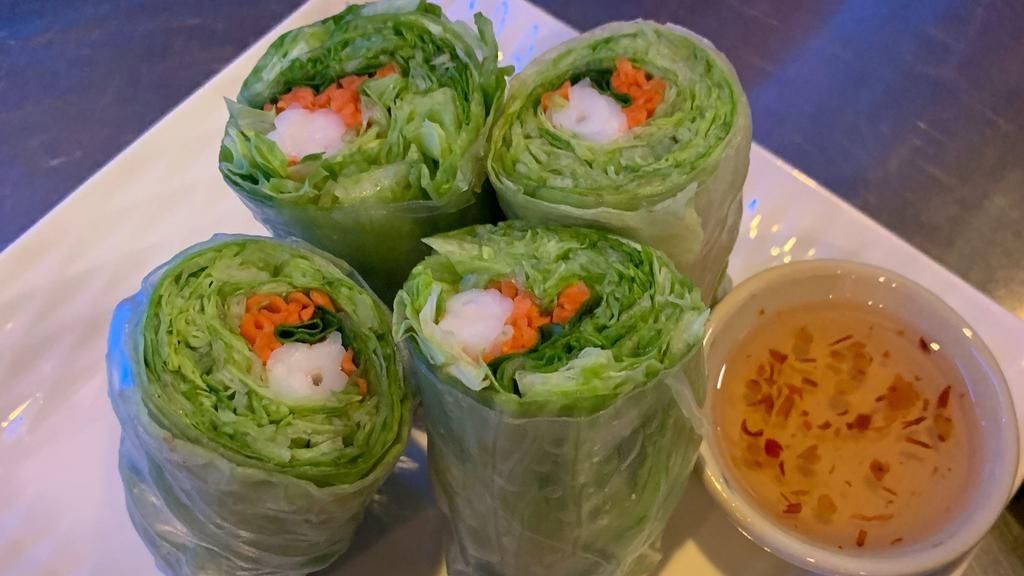 Summer Fresh Roll(2) · Vegetable wrap in fresh rice skin served with peanuts sauce and special sauce choice of chicken, shrimp or tofu.