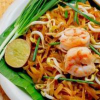Pad Thai · Thai favorite dishes rice noodles sautéed with eggs, ground peanuts, bean sprouts & green on...