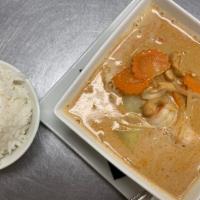 Massamun Curry* · Massaman curry sauce with potatoes onion and carrot garnished with cashew nuts  served with ...