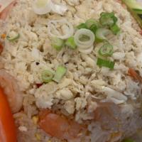 Blue Crab Meat & Shrimp Fried Rice · Stir fried With jasmine rice, eggs, tomatoes, onions, scallions.