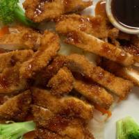 Crispy Chicken Teriyaki · Chicken strips dipped in a light batter and lightly fried served over fresh mix veggies with...