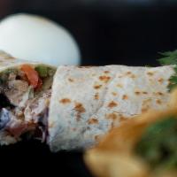 Grilled Vegetarian Burrito · Grilled peppers, onions, and chilies with black beans, melted jack cheese, red leaf lettuce,...