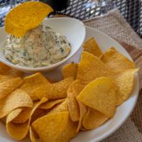Queso-Spinach Dip · Served with tortilla chips.