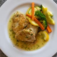 Lemon Herb Chicken · Twin medallions dredged in flour and simmered in a lemon herb butter sauce. Served with garl...