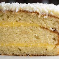 Coconut Cake · Three layers of moist buttery yellow cake and creamy coconut pastry cream with cream cheese ...