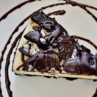 Oreo Cheesecake · Abundance of crushed Oreos added to our traditional NY cheesecake in a chocolate cookie crus...