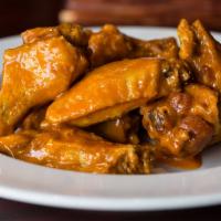 10 Count Traditional Wings · All Wings are served with your choice
of blue cheese or ranch.