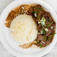 Bistik With Rice · Beef with onions and gravy.